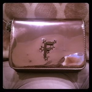 Metal finish baguette shoulder bag.